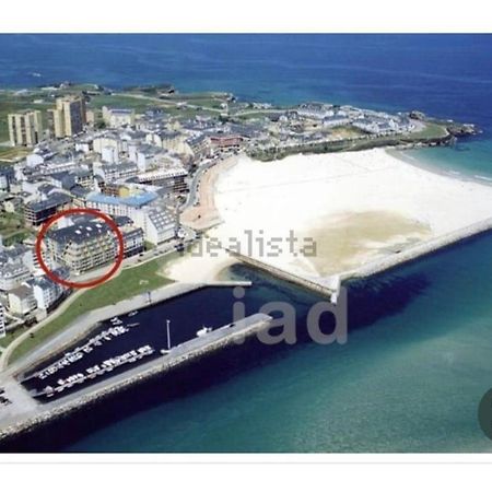 Enfoz Con Parking Y A La Orilla Del Mar Foz Exterior foto