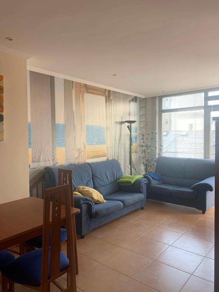 Enfoz Con Parking Y A La Orilla Del Mar Foz Exterior foto